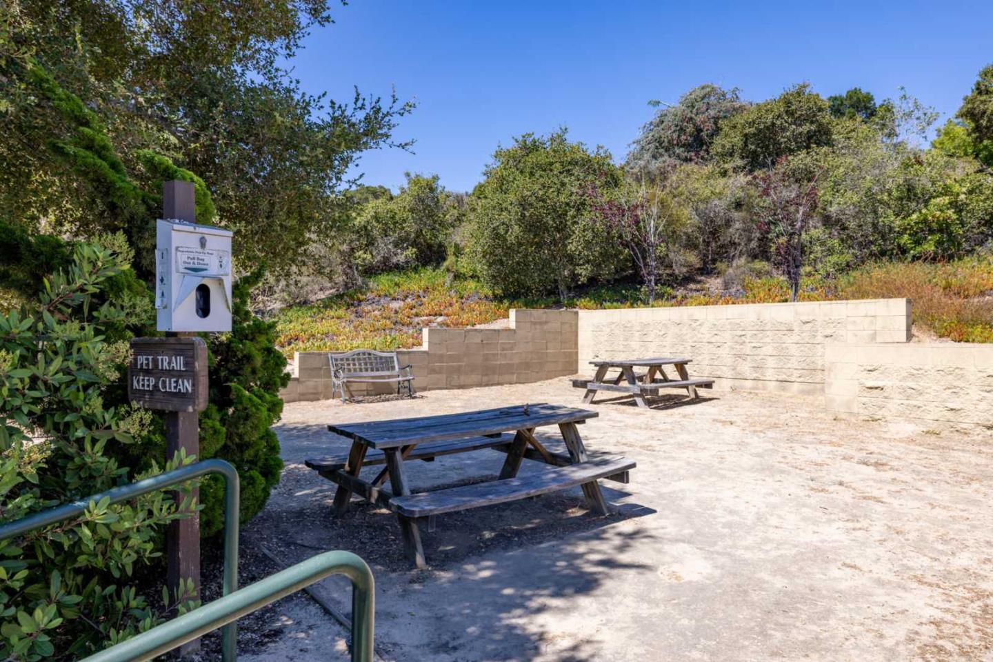 521 Quail Run Court Del Rey Oaks, CA 93940 - Photo 31 of 31 a view of a terrace with chairs and wooden fence