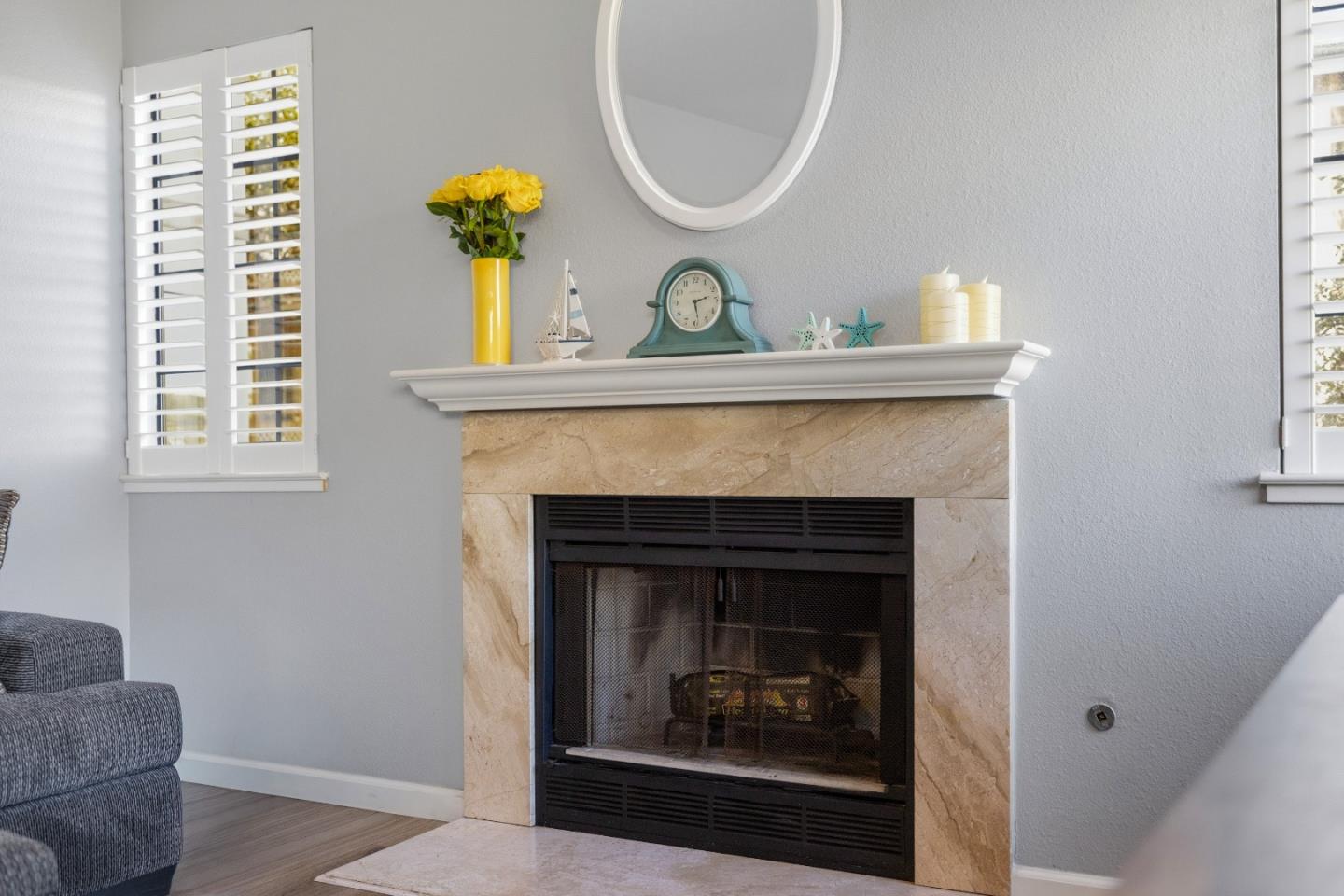 521 Quail Run Court Del Rey Oaks, CA 93940 - Photo 6 of 31 a living room with furniture and a fireplace