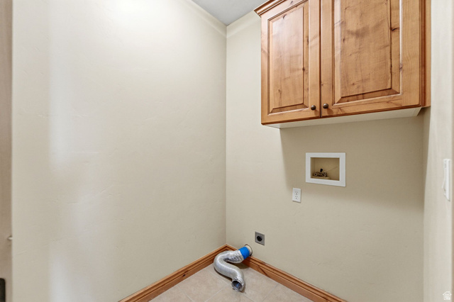 3026 Lower Saddleback Road Park City, UT 84098 - Photo 60 of 71 Laundry room featuring hookup for an electric dryer, cabinet space, hookup for a washing machine, and tile patterned flooring