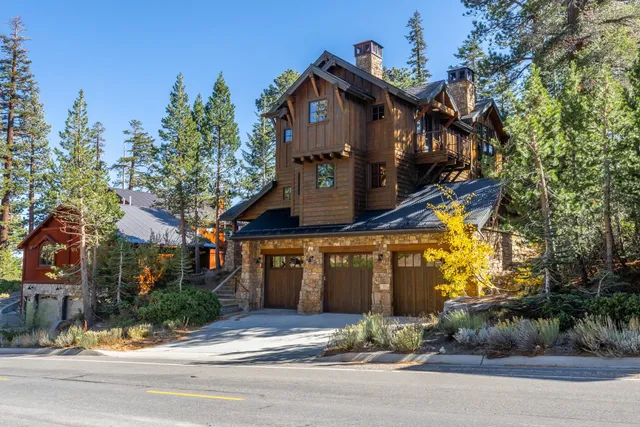 a view of a house and a yard