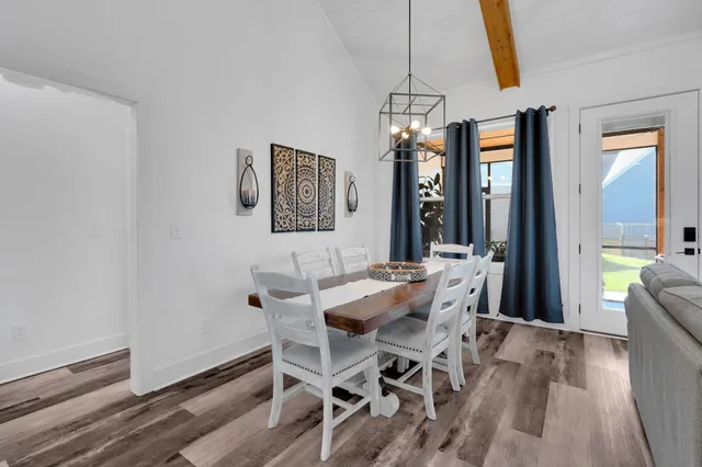 a bedroom with bed and a window