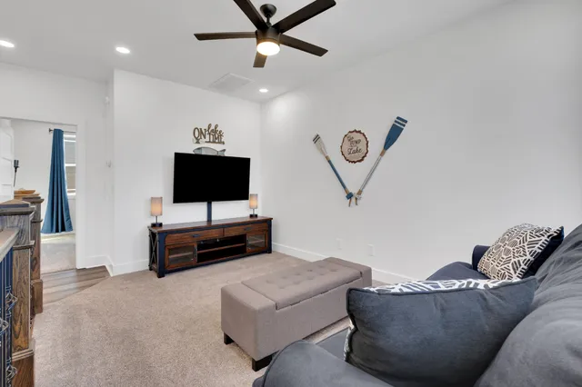 a front view of house with yard and outdoor seating