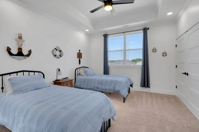 a view of a swimming pool with outdoor seating