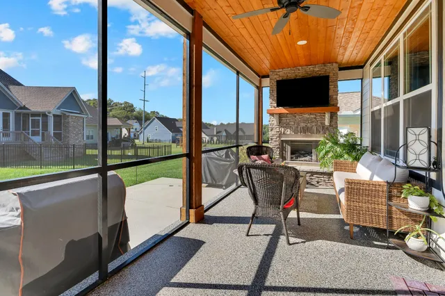 a front view of house with a garden