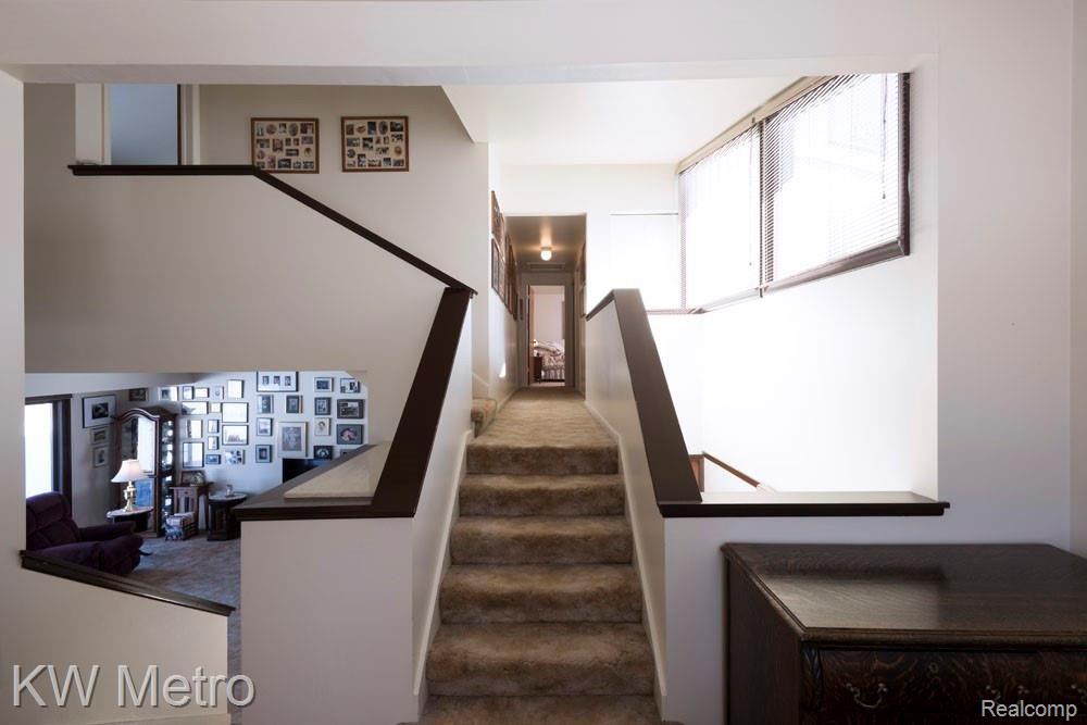 9220 Kier Road Holly, MI 48442 - Photo 25 of 35 _stairs to 3rd level