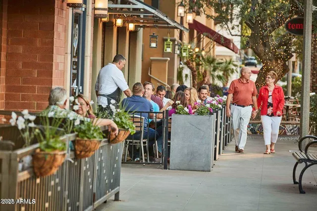a view of a swimming pool with palm trees