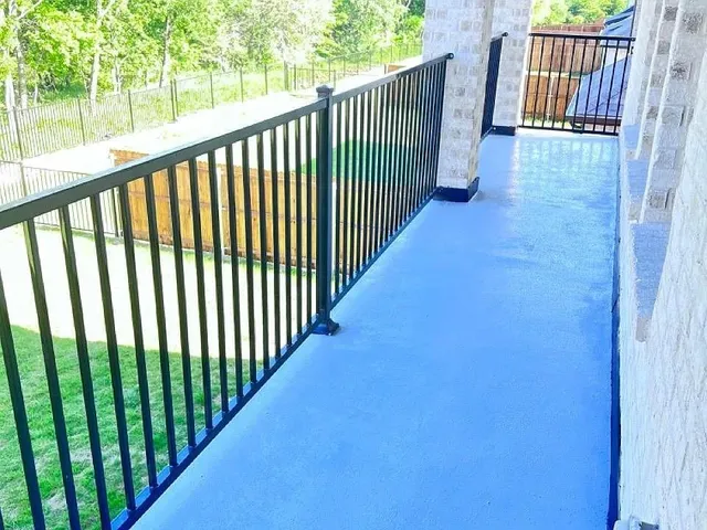 a view of a park with large trees