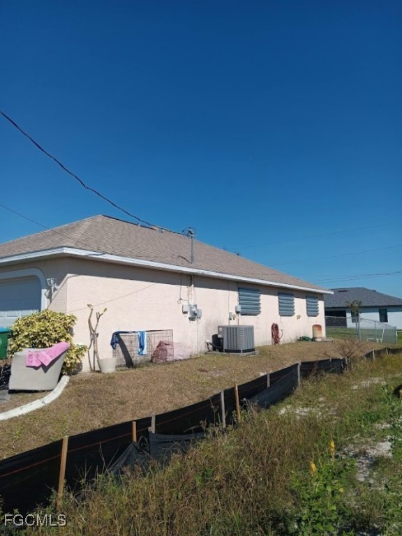 1017 Nelson Road North Cape Coral, FL 33993 - Photo 3 of 9 a view of a house with roof deck