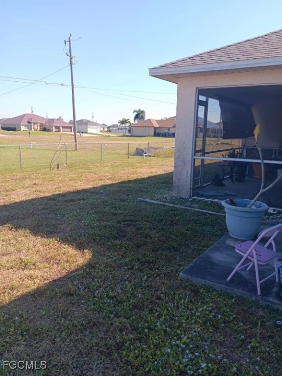 1017 Nelson Road North Cape Coral, FL 33993 - Photo 4 of 9 a view of a backyard with sitting area