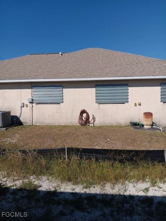 1017 Nelson Road North Cape Coral, FL 33993 - Photo 6 of 9 a view of house with yard