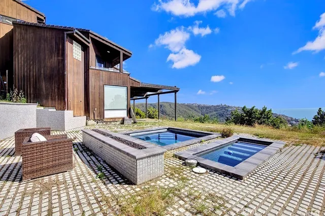 a view of a chairs and table in the terrace
