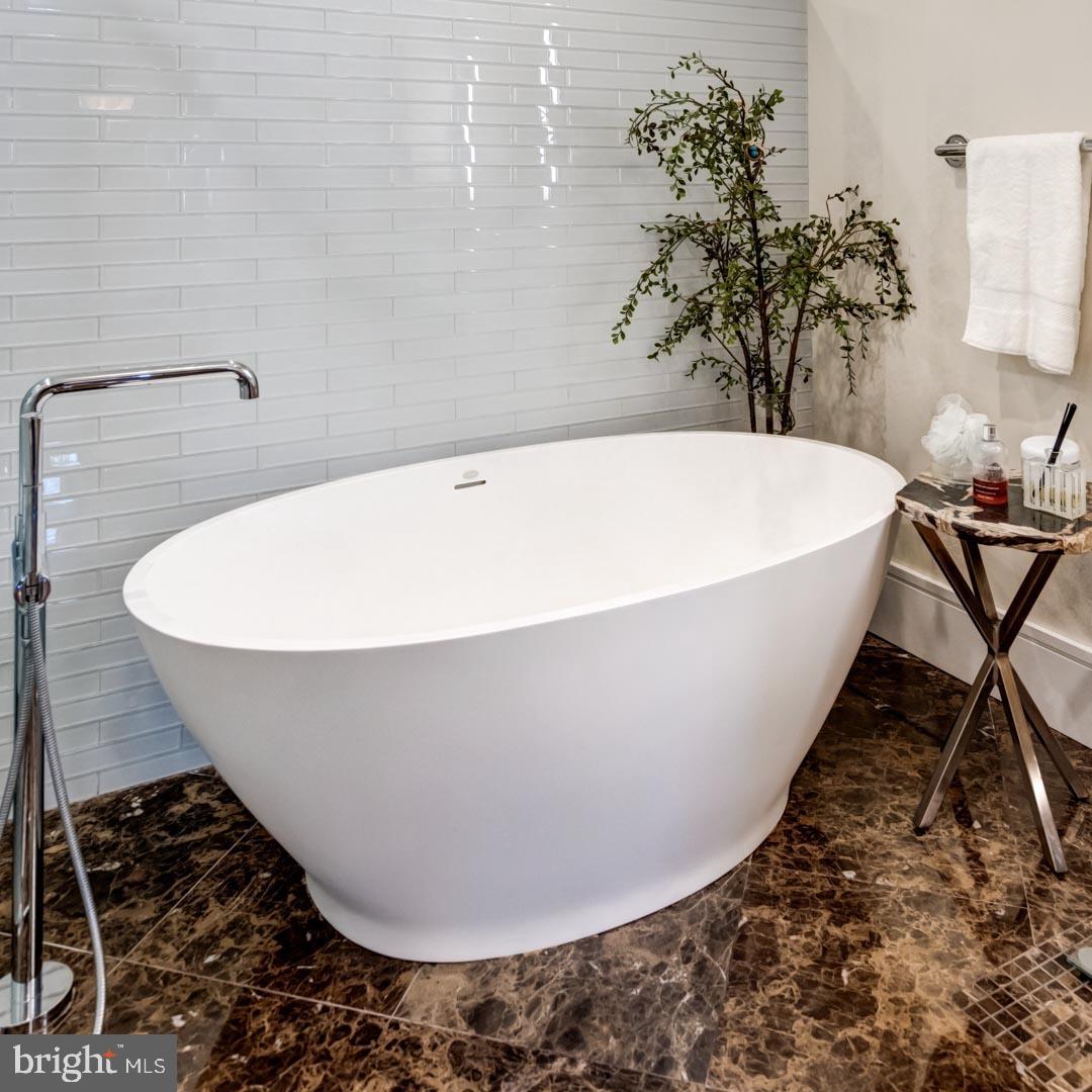 224 Iron Works Way, Unit F Wayne, PA 19087 - Photo 20 of 31 radiant marble floor