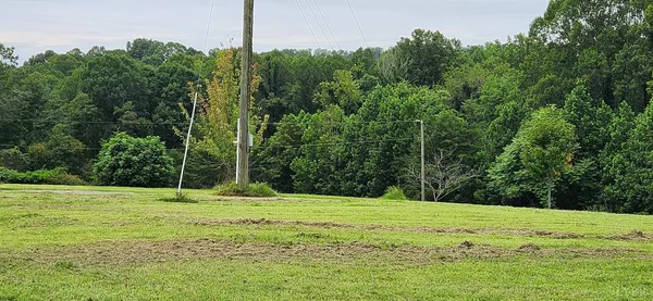 a view of a small space with wooden floor