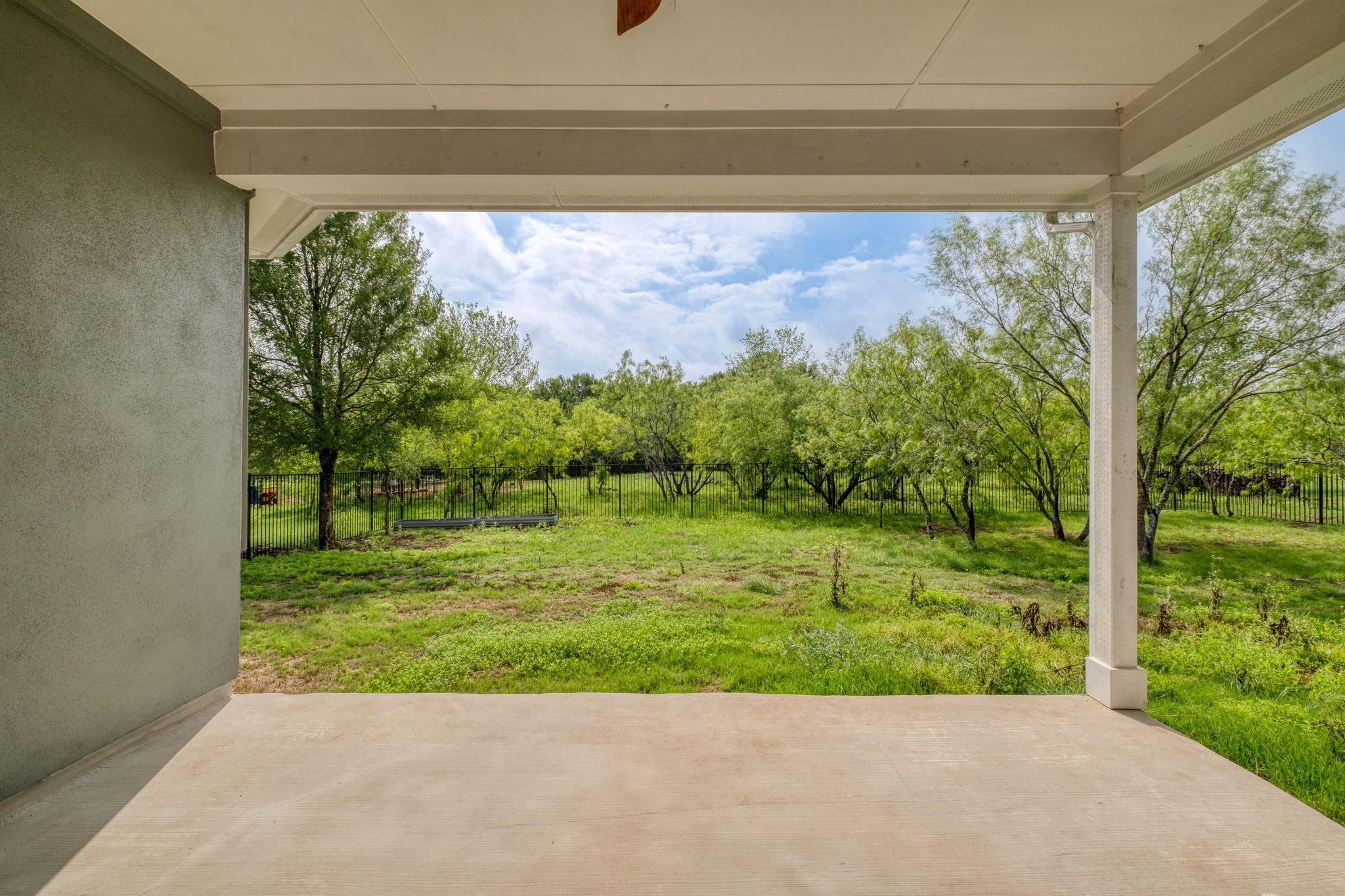 359 Raptor Beak Way Cedar Creek, TX 78612 - Photo 28 of 29 The covered back patio is the perfect place to wind down in the evenings and enjoy the deep quiet of the community