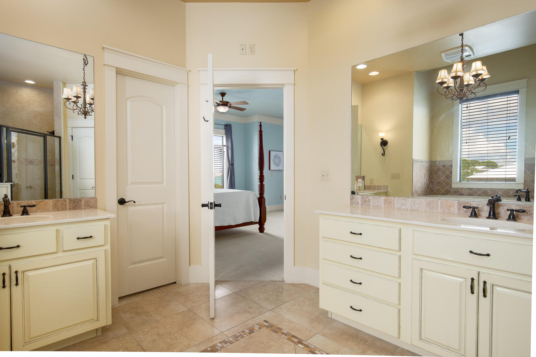 59 Baird Road Santa Rosa Beach, FL 32459 - Photo 13 of 24 a spacious bathroom with a double vanity sink mirror and double