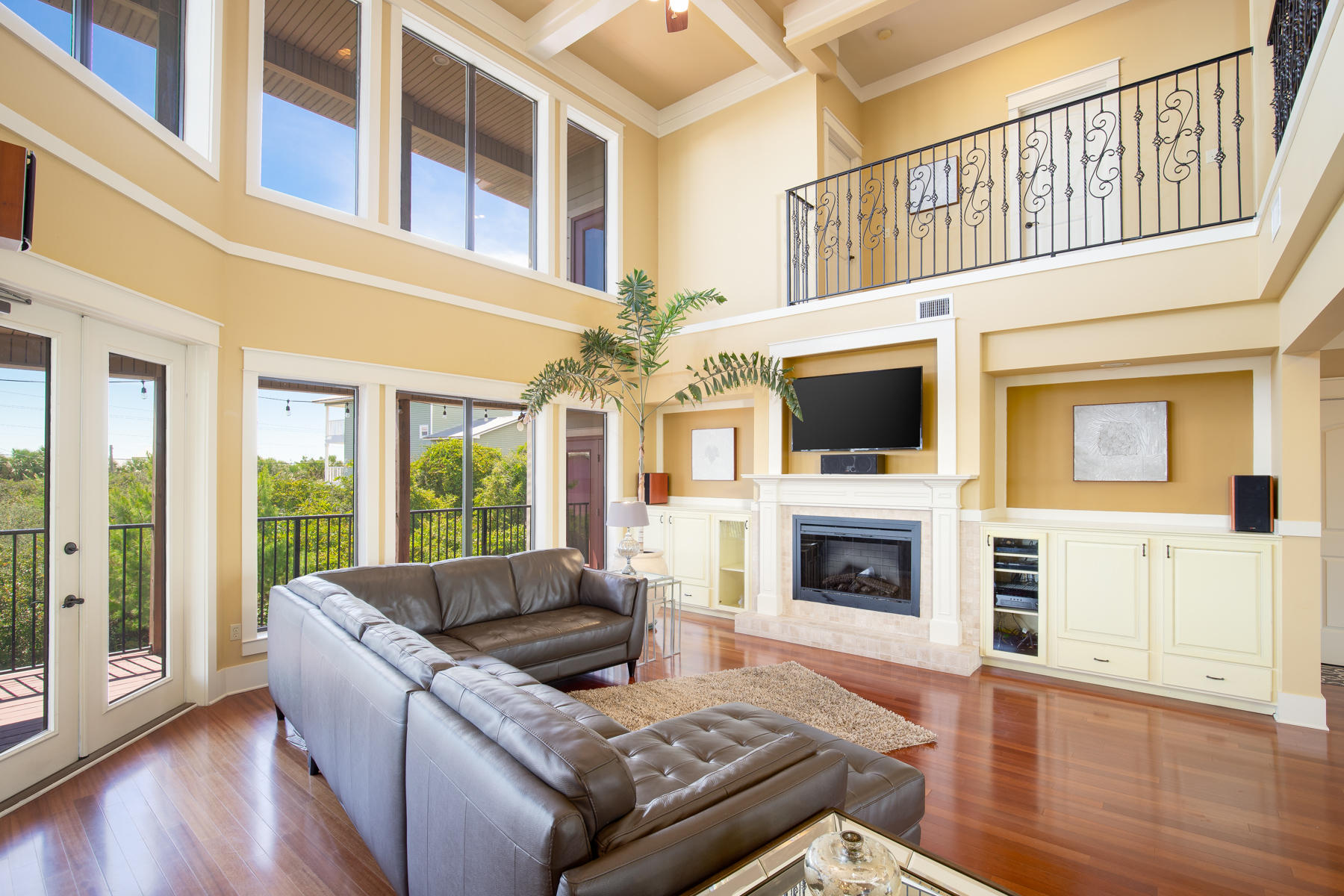 59 Baird Road Santa Rosa Beach, FL 32459 - Photo 3 of 24 a living room with fireplace furniture and a flat screen tv