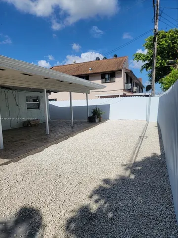 a view of a house with a slide