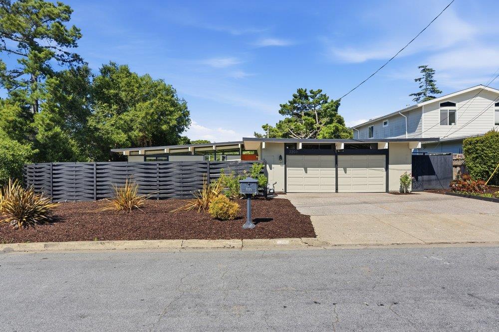 2203 Allegheny Way San Mateo, CA 94402 - Photo 1 of 56 a front view of a house with a yard