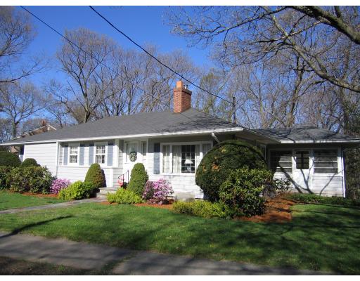72 Gleason Road Reading, MA 01867 - Photo 1 of 9 a front view of a house with garden