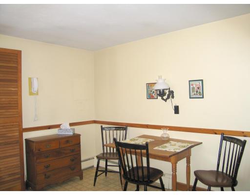 72 Gleason Road Reading, MA 01867 - Photo 4 of 9 a view of a dining room with furniture and wooden floor