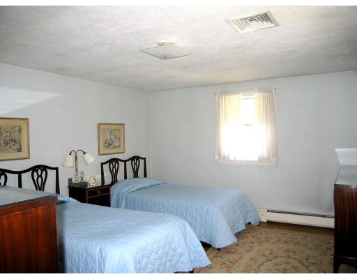 72 Gleason Road Reading, MA 01867 - Photo 5 of 9 a bedroom with two beds and a window