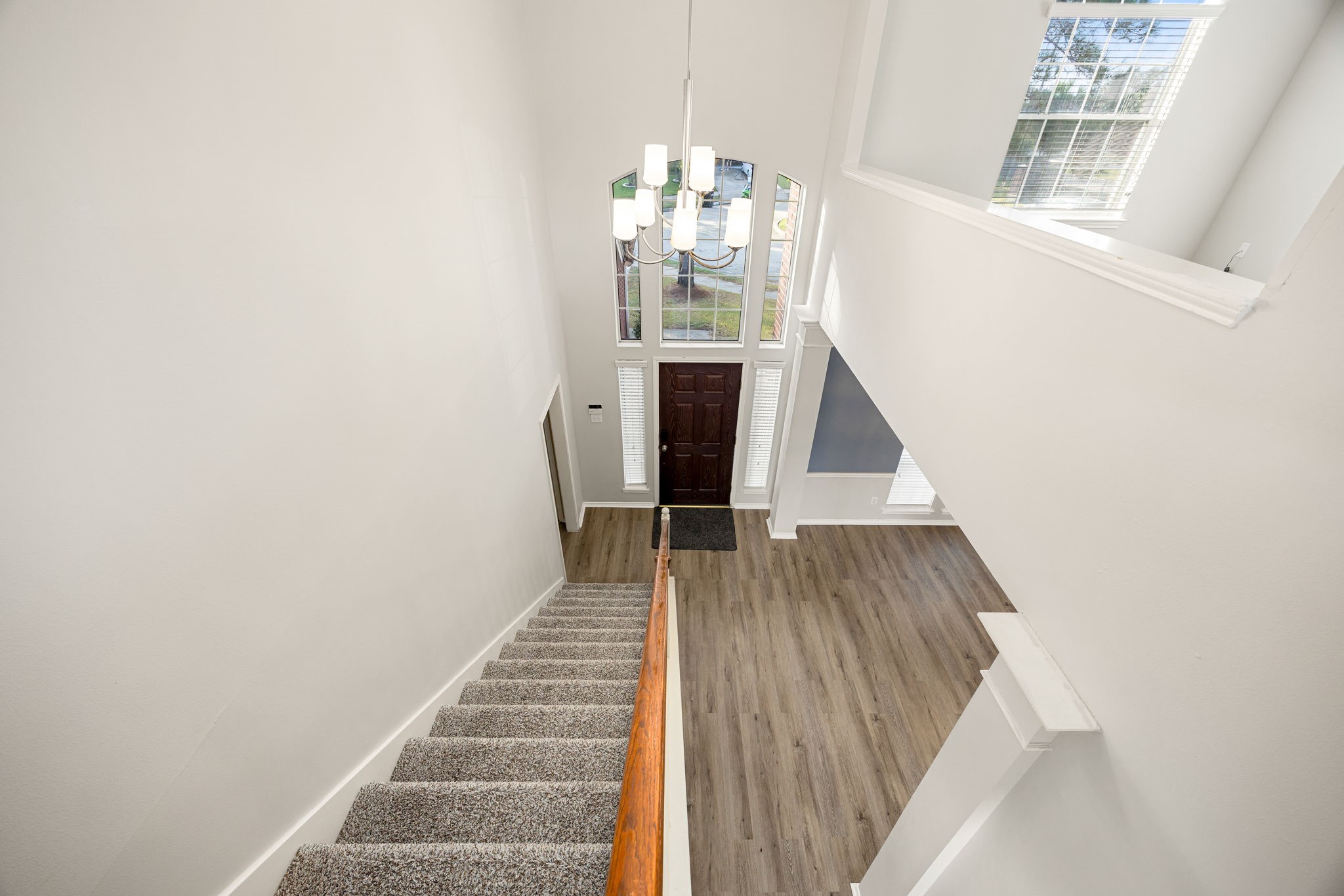 3707 Pecan Court Manvel, TX 77578 - Photo 17 of 35 a view of entryway and hall with wooden floor