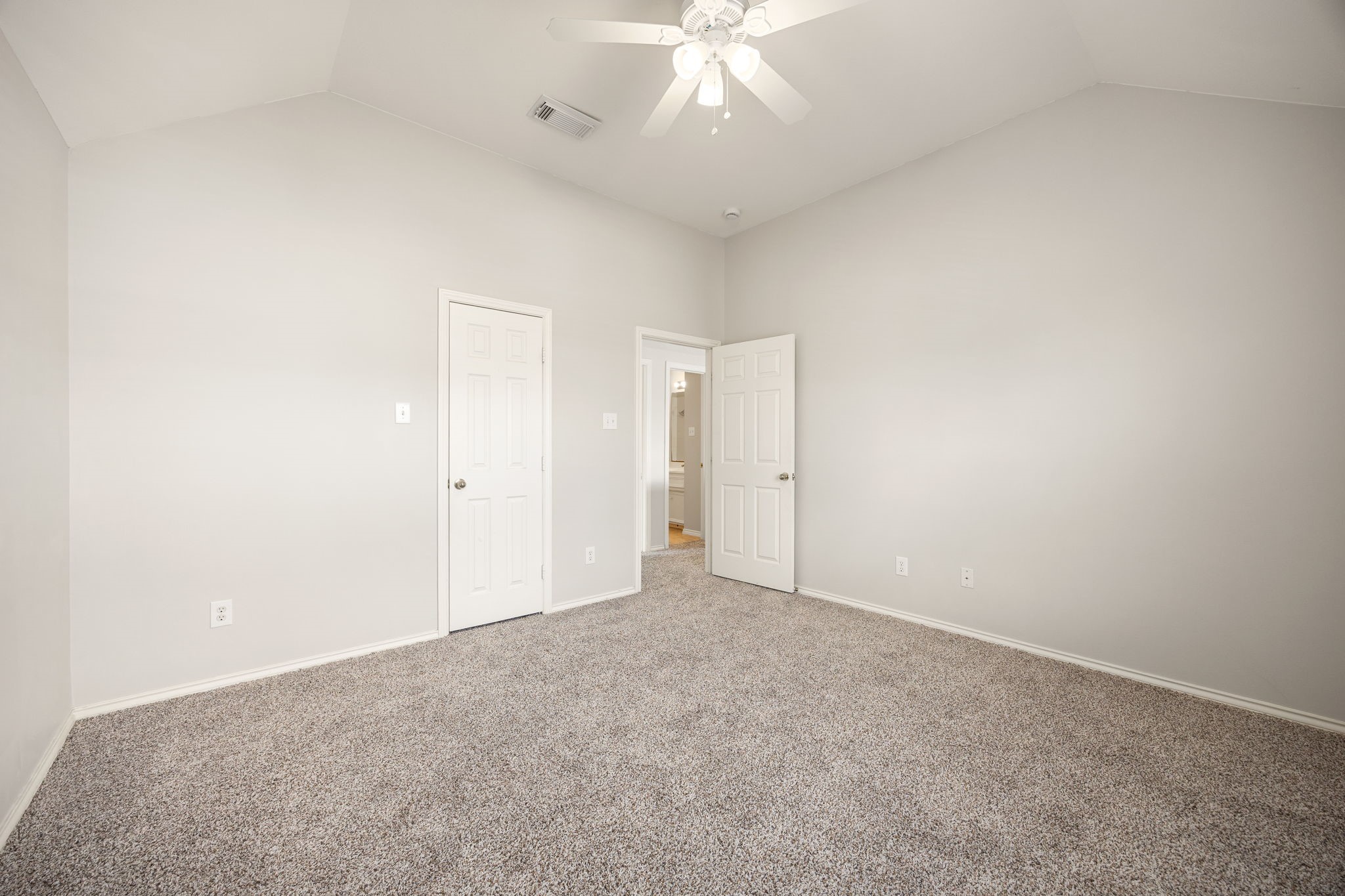 3707 Pecan Court Manvel, TX 77578 - Photo 23 of 35 an empty room with a ceiling fan and a window