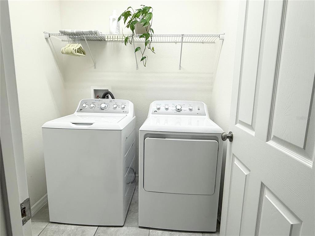 1099 Nathan Ridge Road Clermont, FL 34715 - Photo 11 of 21 a utility room with dryer and washer