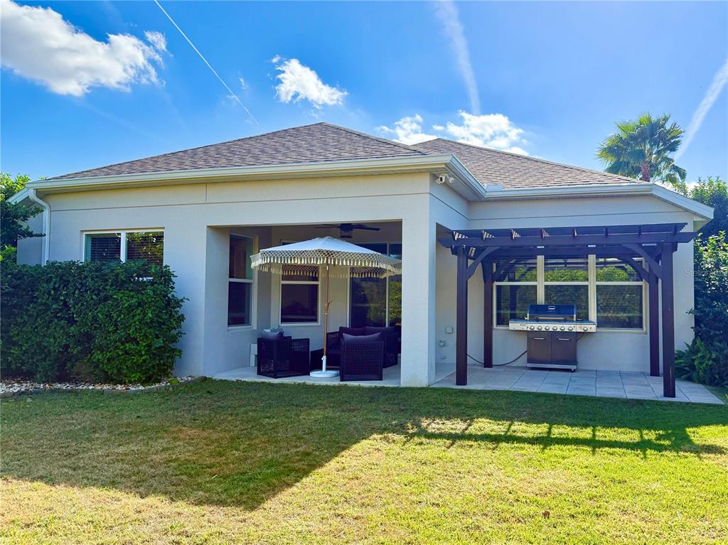 1099 Nathan Ridge Road Clermont, FL 34715 - Photo 14 of 21 a front view of house with yard space and balcony