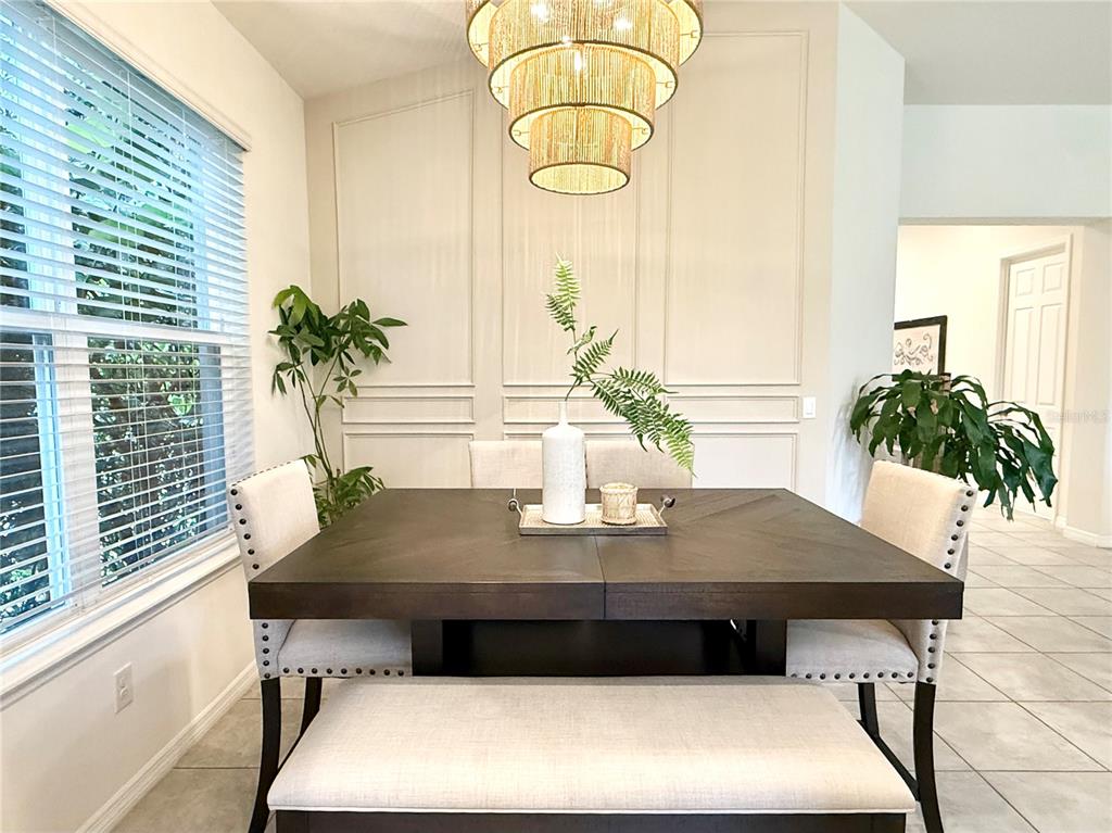 1099 Nathan Ridge Road Clermont, FL 34715 - Photo 4 of 21 a table with a potted plant on a table