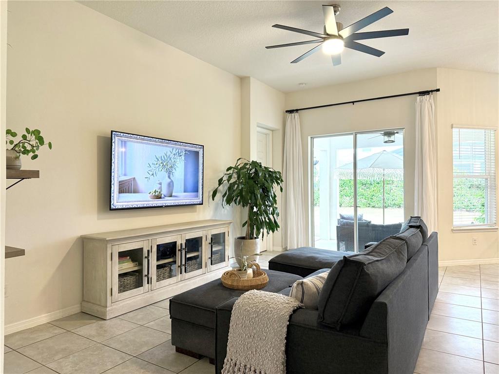 1099 Nathan Ridge Road Clermont, FL 34715 - Photo 5 of 21 a living room with furniture and a window