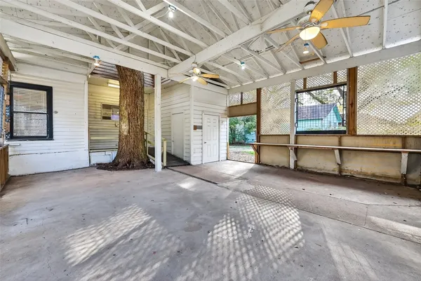 a view of an empty room with a fireplace