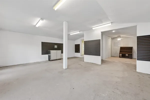 a view of a big room with a large mirror