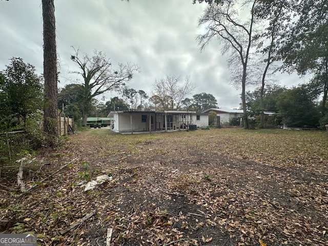 527 Carteret Road Brunswick, GA 31525 - Photo 22 of 23 a view of a house with a yard