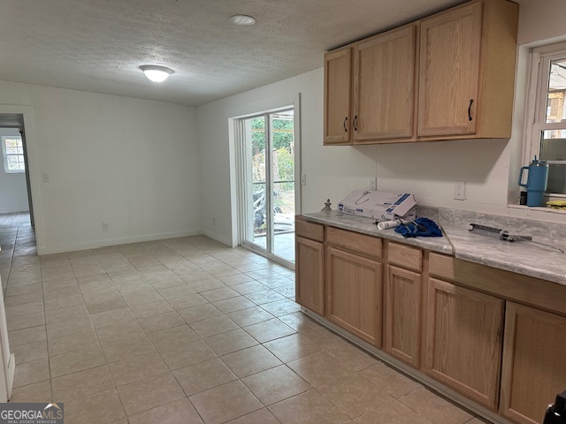 527 Carteret Road Brunswick, GA 31525 - Photo 5 of 23 a kitchen with stainless steel appliances granite countertop a sink stove and cabinets
