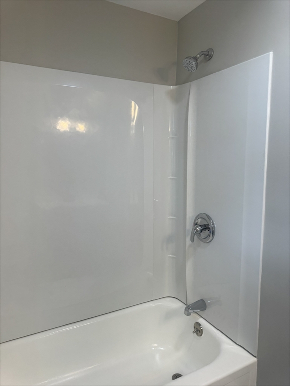 26 Hobson Street Methuen, MA 01844 - Photo 10 of 26 a bathroom with a tub and a shower
