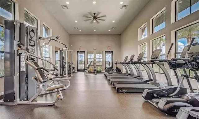 a view of a lake with houses in the back