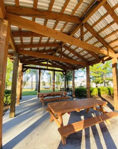 a view of a backyard with a patio
