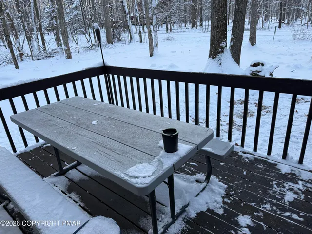 a view of a balcony with chairs