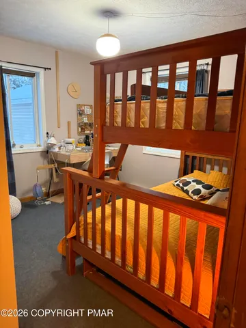 a view of a porch with a bench