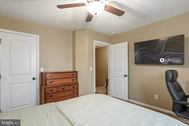 a view of room with furniture and ceiling fan