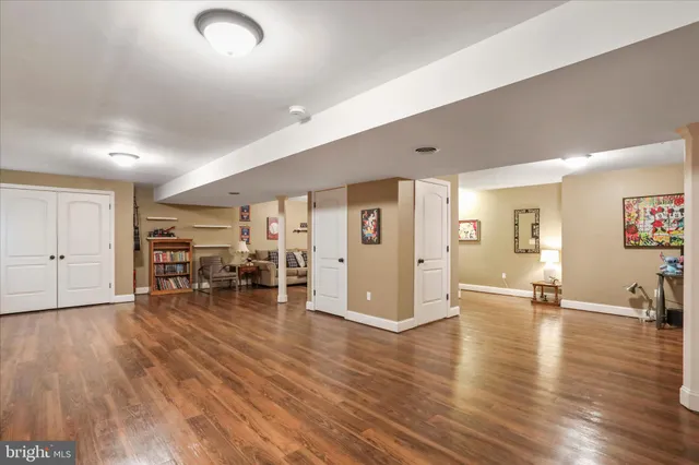 a view of a livingroom with furniture and wooden floor