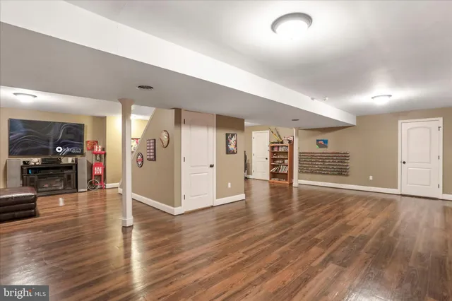 a view of a livingroom with wooden floor