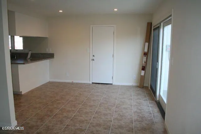 a view of hallway with livingroom