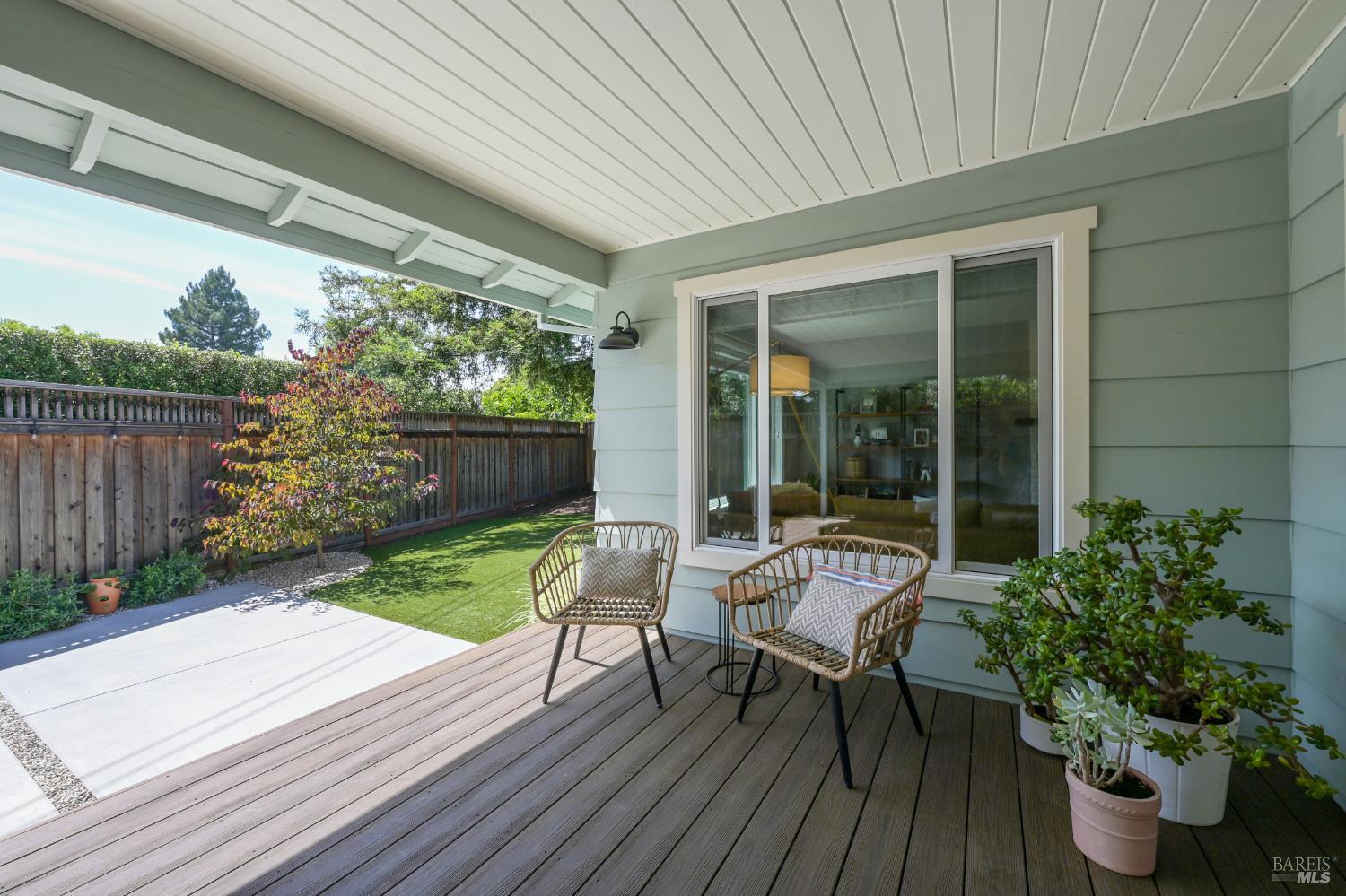 2009 Hidden Valley Drive Santa Rosa, CA 95404 - Photo 25 of 26 a view of a chair and table in backyard of the house