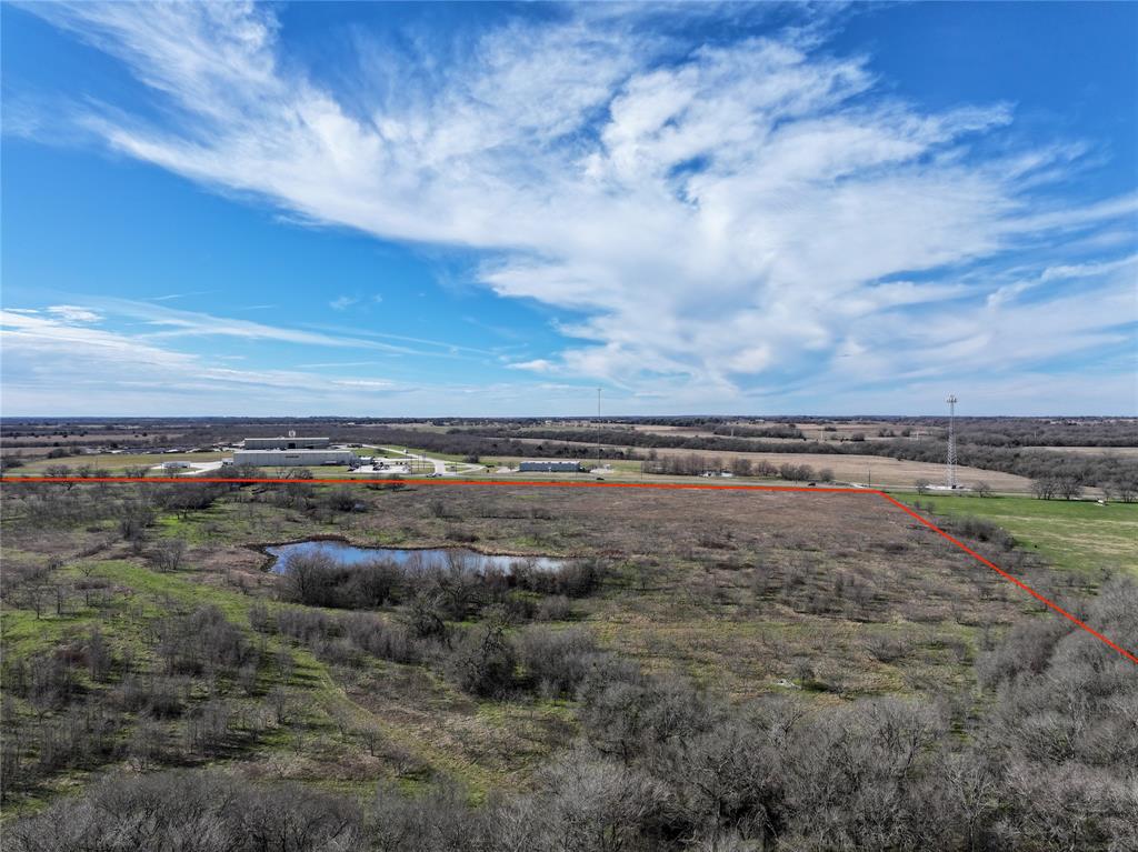 0 Highway 14 Groesbeck, TX 76642 - Photo 4 of 13 a view of a pathway of a field with lots of bushes