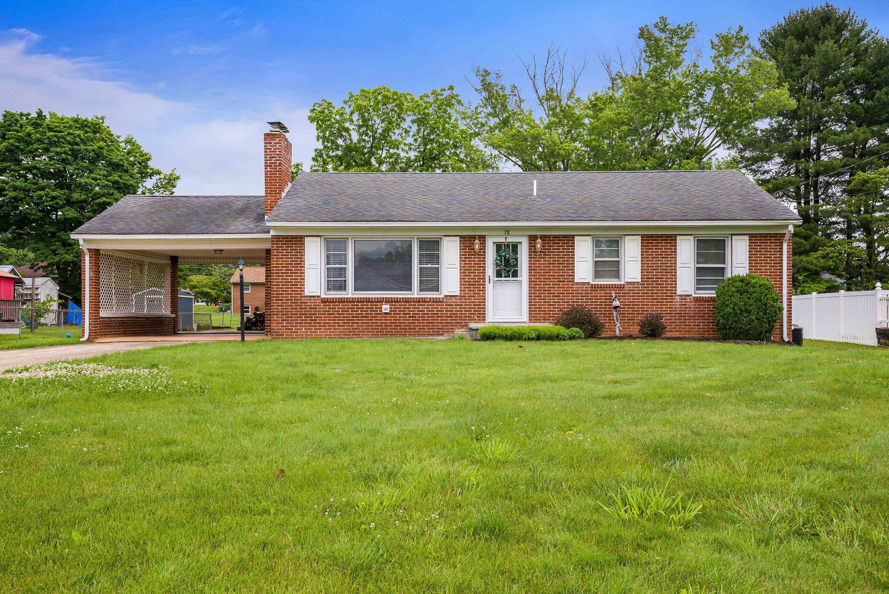 front view of a house with a yard