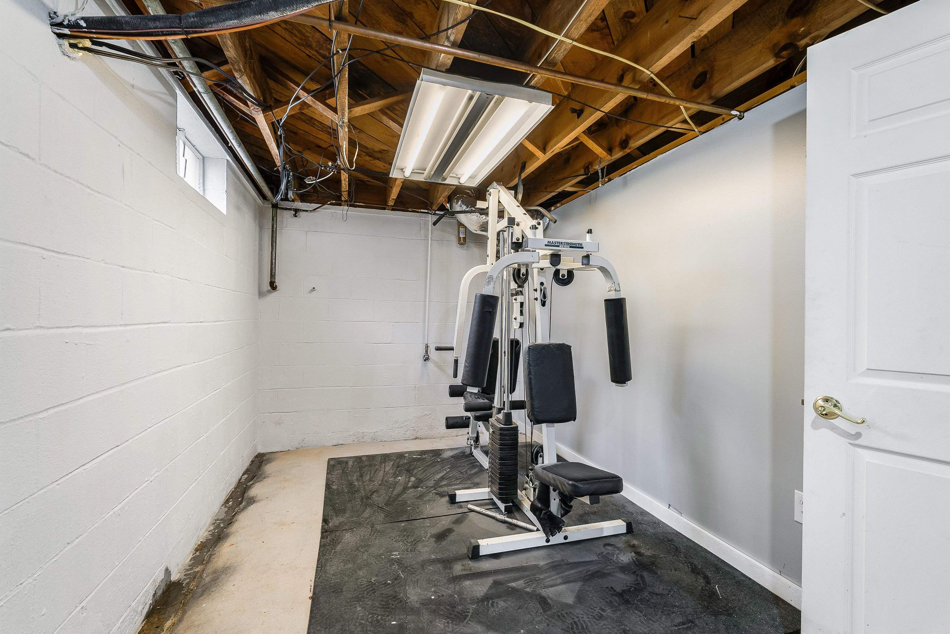 78 Stuart Avenue Stuarts Draft, VA 24477 - Photo 28 of 41 a view of a room with gym equipment