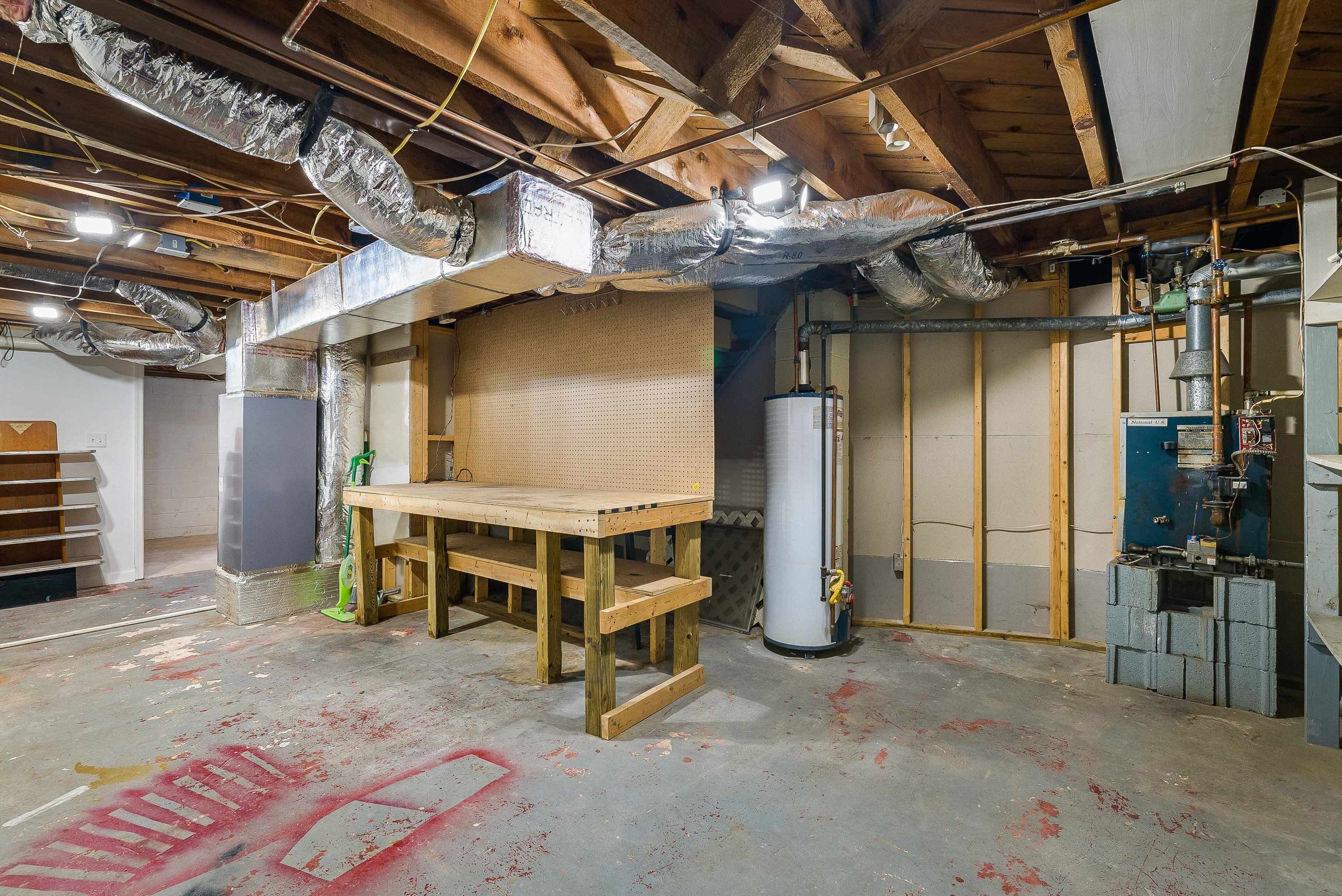 78 Stuart Avenue Stuarts Draft, VA 24477 - Photo 31 of 41 a view of an empty room with wooden shelves