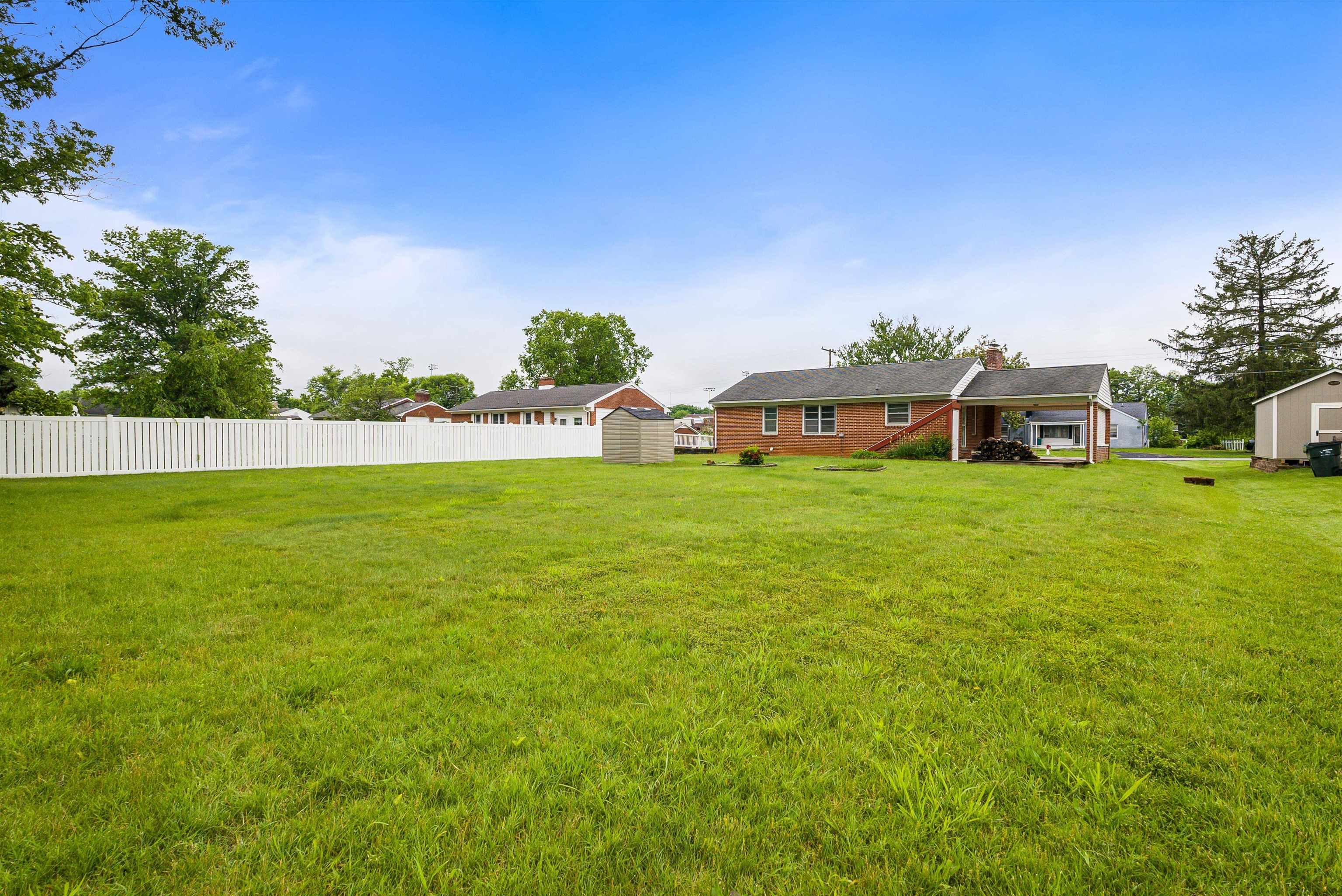 78 Stuart Avenue Stuarts Draft, VA 24477 - Photo 40 of 41 a view of a house with a big yard